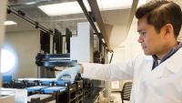 Researcher conducting tests in a lab